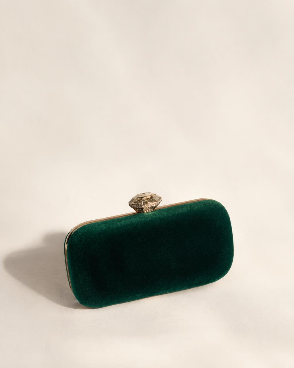 Emerald velvet minaudière with a faceted crystal clasp
